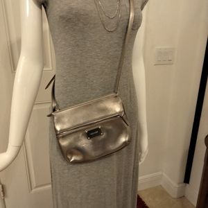 Silver Nine West crossbody bag. 7 1/2 x 9".